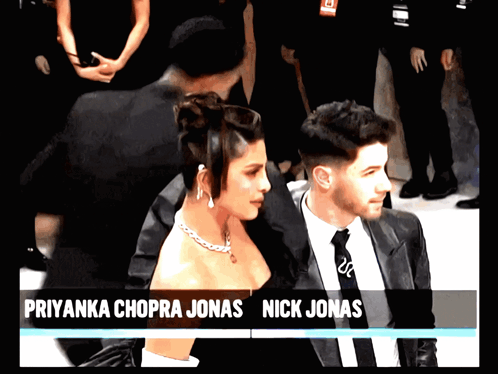 A Picture Of Priyanka Chopra Jonas And Nick Jonas Is Displayed GIF