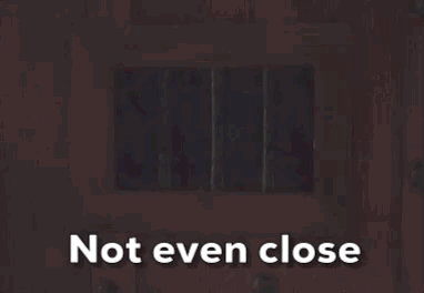a picture of santa claus behind bars with the words not even close above him