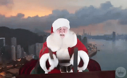 A Picture Of Santa Claus With A Crown On It GIF