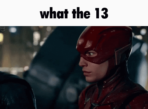 A Picture Of The Flash With The Words " What The 13 " On The Bottom GIF