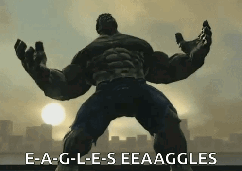 A Picture Of The Hulk With The Words E-A-G-L-E-S Eeaaggles Written Below Him GIF