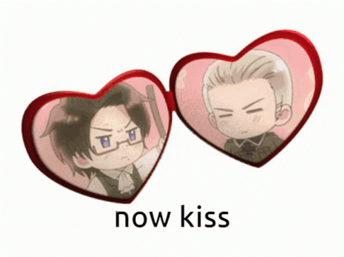 A Picture Of Two Hearts With The Words Now Kiss Below Them GIF