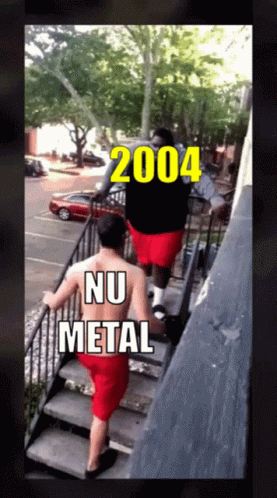 A Picture Of Two Men Walking Up Stairs With 2004 Nu Metal Written On The Bottom GIF