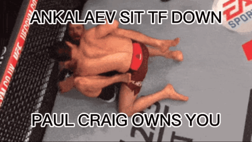 A Picture Of Two Men Wrestling With The Caption Ankalev Sit Tf Down GIF
