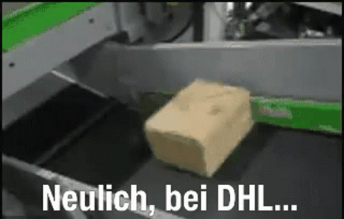 A Piece Of Cheese Is On A Conveyor Belt With The Words Neulich Bei Dhl Written Below It . GIF