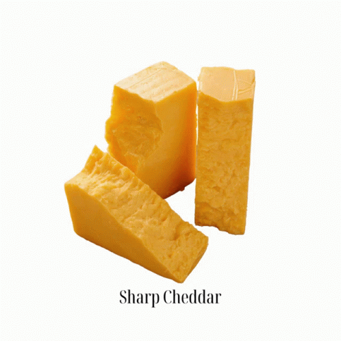 A Piece Of Honey Goat Gouda Is Shown On A White Background GIF