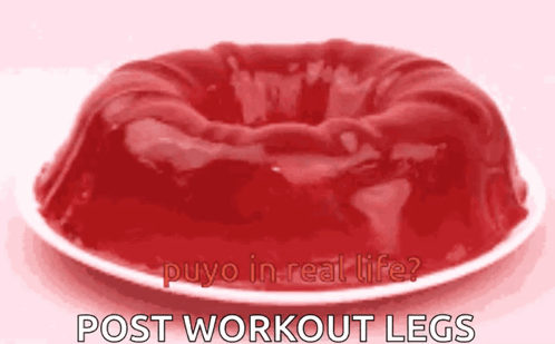 A Piece Of Red Jelly On A White Plate With The Words Puyo In Real Life Post Workout Legs Written Below It GIF