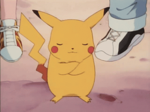 A Pikachu With Its Eyes Closed Is Standing Next To A Person 'S Foot GIF