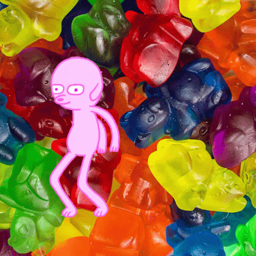 A Pile Of Colorful Gummy Bears With A Purple Cartoon Character Standing In The Middle GIF