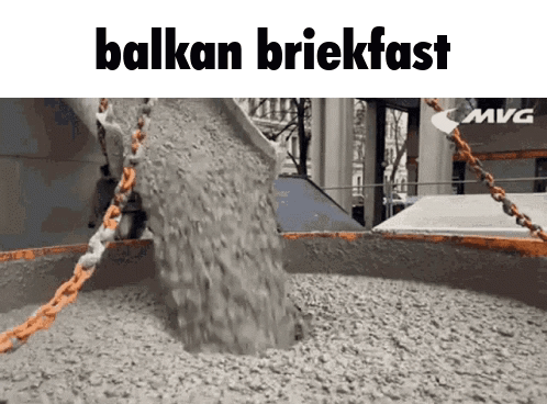 A Pile Of Concrete Is Being Poured Into A Container With The Words ' Balkan Briekfast ' Written On The Bottom GIF