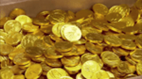 A Pile Of Gold Coins In A Box With One Coin That Says ' A ' On It GIF