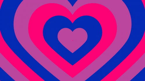 A Pink And Blue Heart With A Smaller Heart In The Center GIF