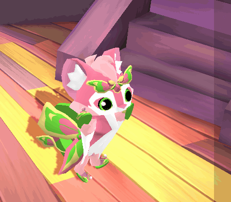 A Pink And White Cartoon Character With Green Wings GIF