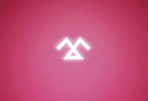 A Pink Background With A Glowing Face On It GIF