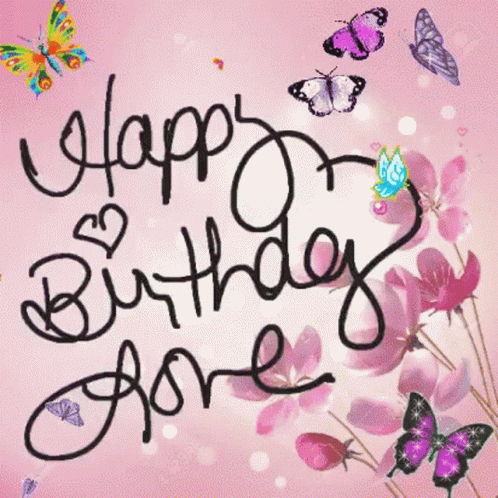 A Pink Background With Flowers And Butterflies And The Word Happy On It GIF