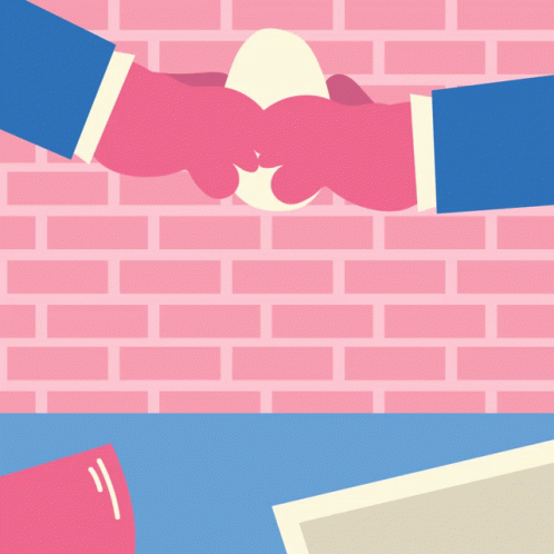 A Pink Brick Wall Is Behind Two Hands Shaking Hands GIF
