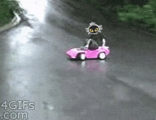 A Pink Car Is Driving Down A Road With A 4Gifs.com Watermark GIF