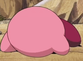 A Pink Cartoon Character Is Laying On The Ground With A Sad Face . GIF