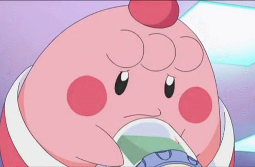 A Pink Cartoon Character With A White Egg In Its Mouth Is Smiling GIF