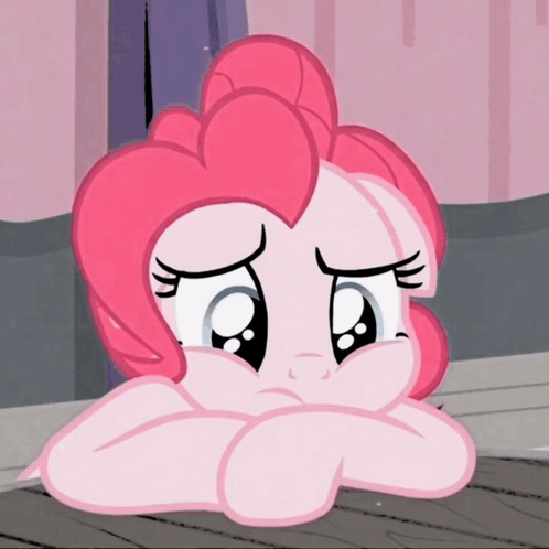 A Pink Cartoon Pony With A Sad Look On Its Face GIF