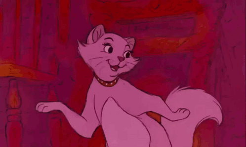 A Pink Cat Wearing A Gold Collar Is Sitting On A Pink Background . GIF