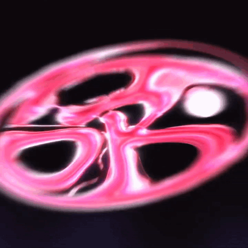 A Pink Circle With A White Circle In The Center GIF
