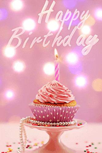 A Pink Cupcake With A Candle And The Words Happy Birthday On The Bottom GIF