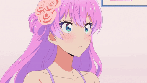 A Pink Haired Anime Girl With A Flower In Her Hair GIF