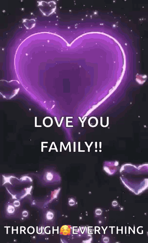 A Pink Heart Is Glowing In The Dark And Says `` Love You Family '' . GIF