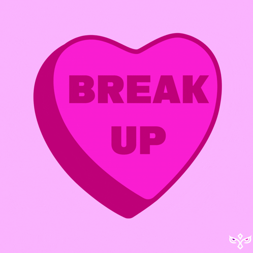 A Pink Heart Shaped Candy With The Words Break Up Written On It GIF