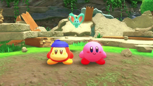 A Pink Kirby And A Blue Kirby Are Standing Next To Each Other GIF