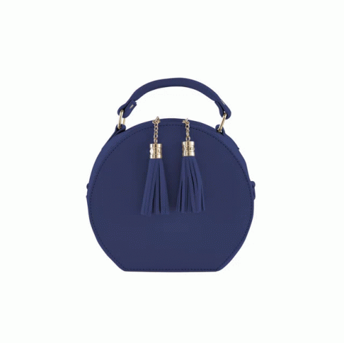 A Pink Round Purse With Tassels On The Side GIF