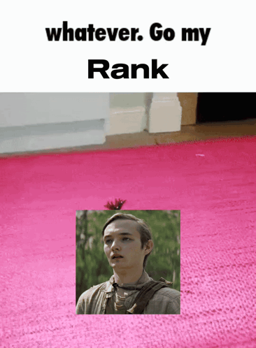 A Pink Rug With A Picture Of A Man And The Words " Whatever Go My Rank " On Top GIF