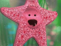 A Pink Starfish With A Smile On Its Face Is Swimming In The Ocean . GIF