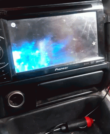 A Pioneer Radio With A Blue Screen And A Star On It GIF
