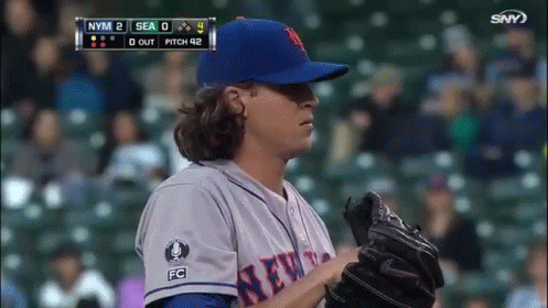 A Pitcher For The New York Mets Throws The Ball GIF