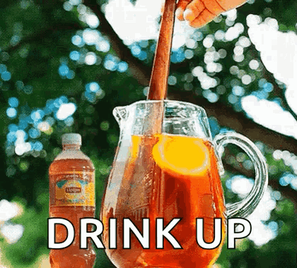 Pouring Iced Tea Into Pitcher With Spoon GIF