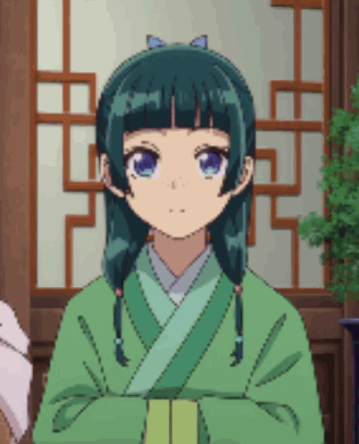 A Pixel Art Of A Girl In A Green Kimono With Her Arms Crossed GIF