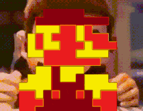 A Pixel Art Of A Man Eating A Burger GIF