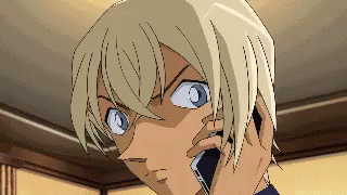 A Pixel Art Of A Man Talking On A Cell Phone . GIF