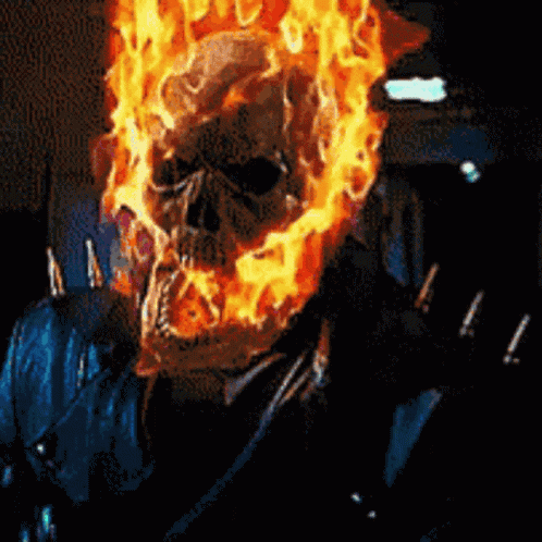 A Pixelated Image Of A Ghost Rider With Flames Coming Out Of His Head GIF