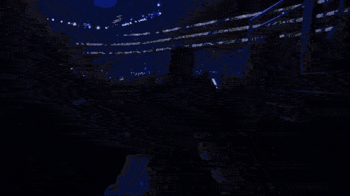 A Pixelated Image Of A Man In A Blue Jacket GIF