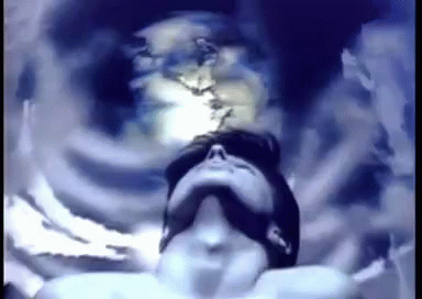 a pixelated image of a man looking up at something