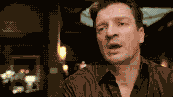 A Pixelated Image Of A Man 'S Face With His Mouth Open GIF