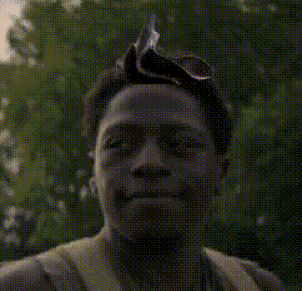 A Pixelated Image Of A Man Wearing A Headband GIF