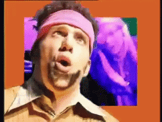 A Pixelated Image Of A Man With A Pink Headband GIF
