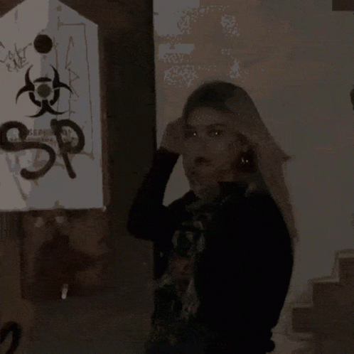 A Pixelated Image Of A Woman 'S Face With A Blurred Background GIF