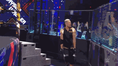A Pixelated Image Of A Wrestler In A Wrestling Ring GIF