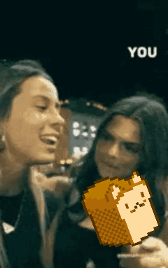 A Pixelated Image Of Two Women With The Word You In The Upper Right Corner GIF