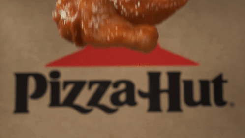 A Pizza Hut Logo Is Behind Some Chicken Wings GIF